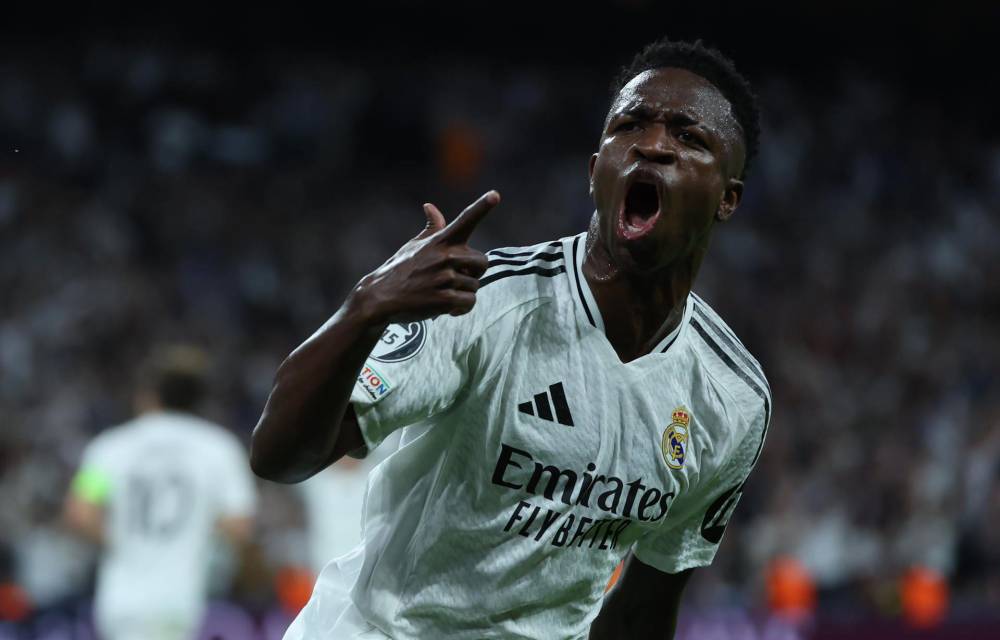 El delantero brasileño del Real Madrid Vinicius Jr. celebra un gol anotado en el encuentro de la Liga de Campeones contra el Borussia Dortmund en el estadio Santiago Bernabéu.