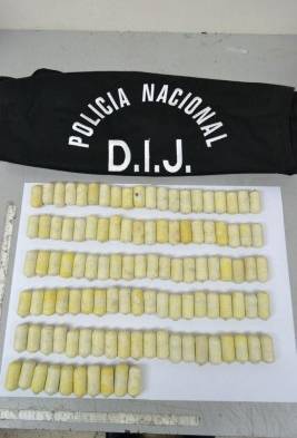 Policía  decomiso comprimidos.