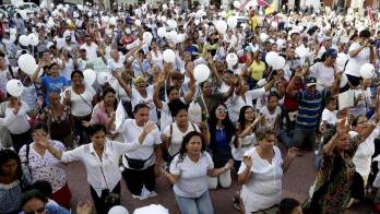Miembros de la iglesia cristiana La Unción participan en una protesta&nbsp;.