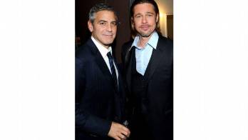 Pitt conoce a los gemelos Clooney