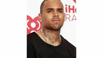 El artista está acusado de dar un puñetazo al fotógrafo.