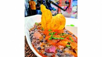 Guacho de guandú con coco y tasajo