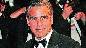 Clooney alega que las fotos fueron tomadas sin permiso.