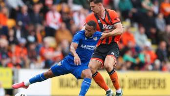 Vio acción en la primera y segunda división de Escocia con el St. Johnstone.