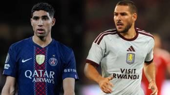 El defensor marroquí del PSG, Achraf Hakimi y el mediocampista argentino del Aston Villa, Emiliano Buendía.