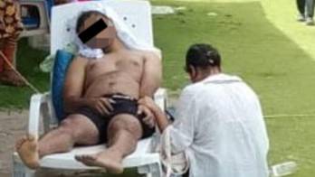 Personas que estaban en la playa intentaron auxiliar al turista antes de trasladarlo al centro de salud.