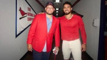 Iván Herrera junto a Yadier Molina.