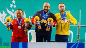 Rey Dimas (c), ganó dos medallas de oro.