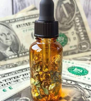 Conoce las propiedades mágicas del aceite ‘Dibujo de dinero’