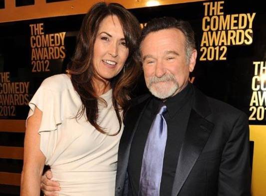Robin junto a su última esposa, Susan Schneider.