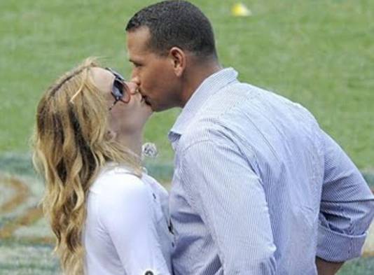 Junto al beisbolista Alex Rodríguez.