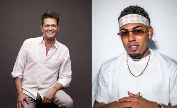 Los cantantes Carlos Vives y Myke Towers.