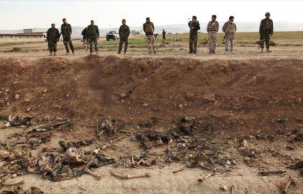 Los cadáveres habían sido arrojados en una zona del barrio de Al Shuhada .