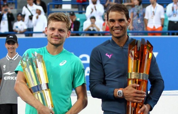 El experimentado tenista español junto a su rival David Goffin.