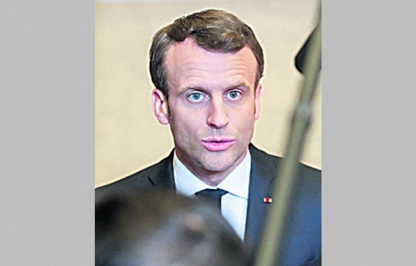 Macron pide respuesta global a la pandemia