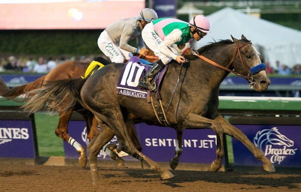 ‘Arrogate' con el veterano Mike Smith por fuera superando a ‘California Chrome'.