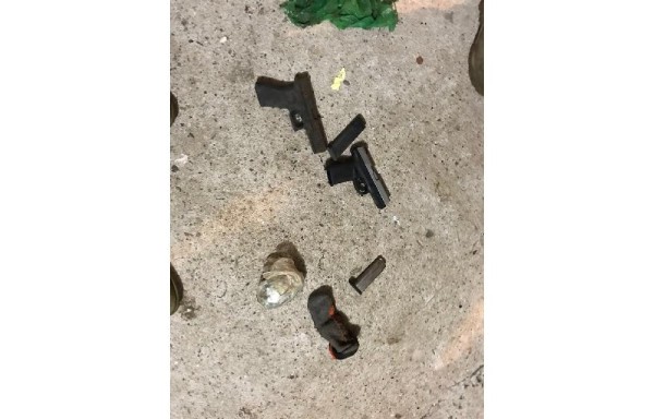 Encuentran granada, armas y municiones en Colón