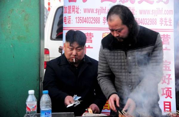 Dictador norcoreano junto a su doble.