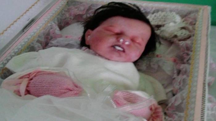 ¡No culpable, por el caso de muñeca en el ataúd!